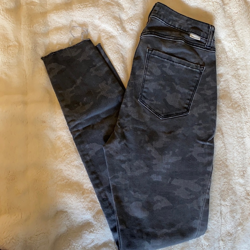 Black camo skinny jeans